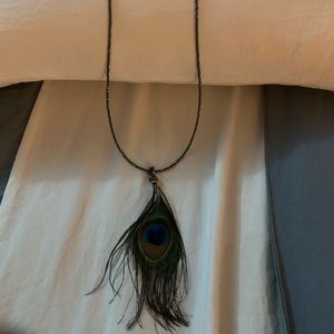 Unique crystal and peacock feather necklace!